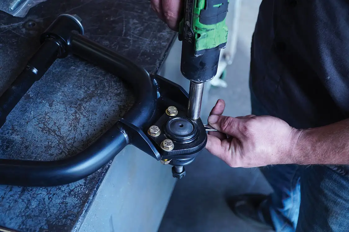 ball joints secured onto the upper control arms