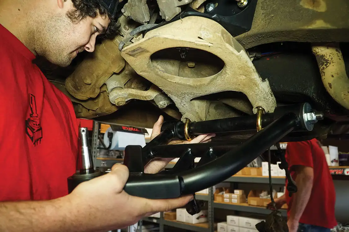 Lower control arms installed using the factory U-bolts and nuts