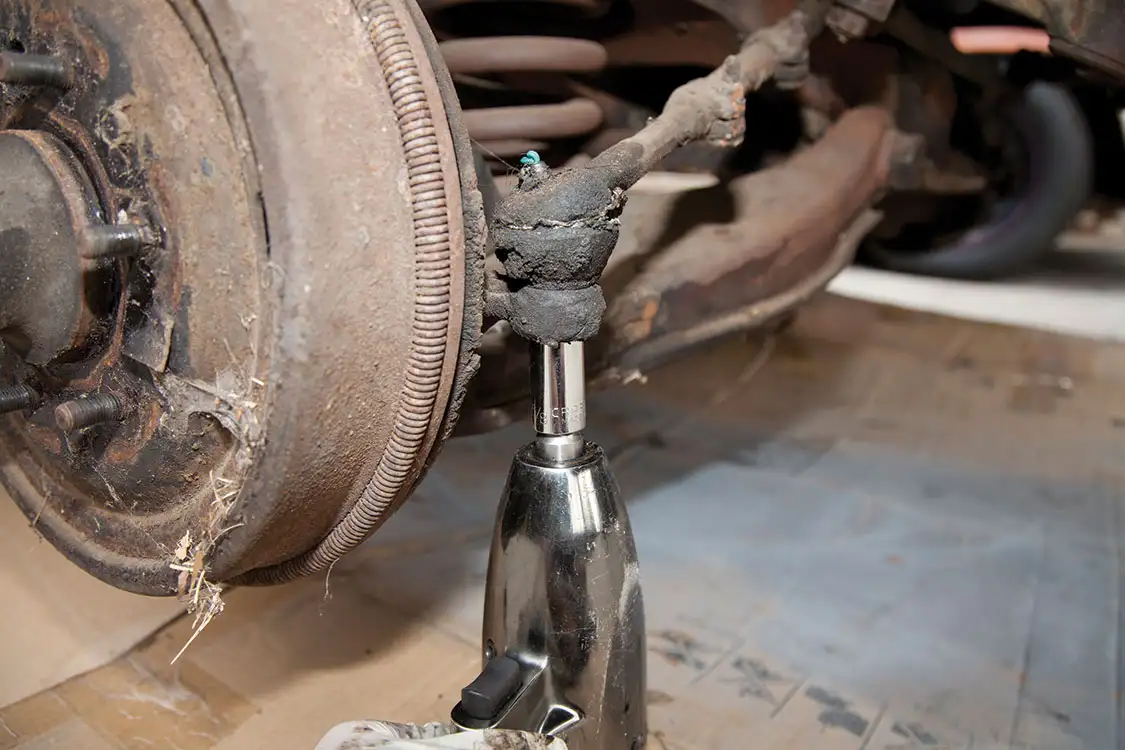 Tie rods unbolted from the stock spindles