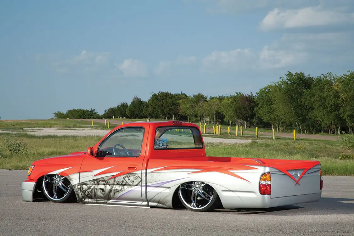 1997 Toyota Tacoma ultra orange and BMW silver