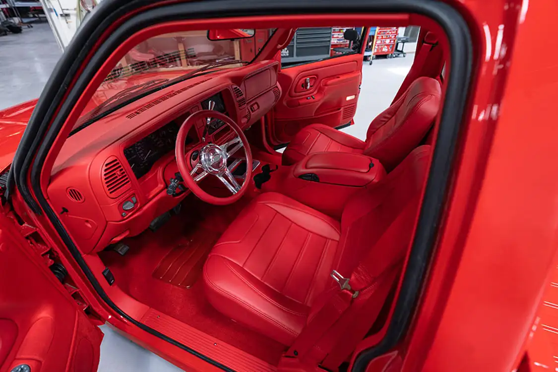 Snowden bucket seats upholstered with red Relicate leather