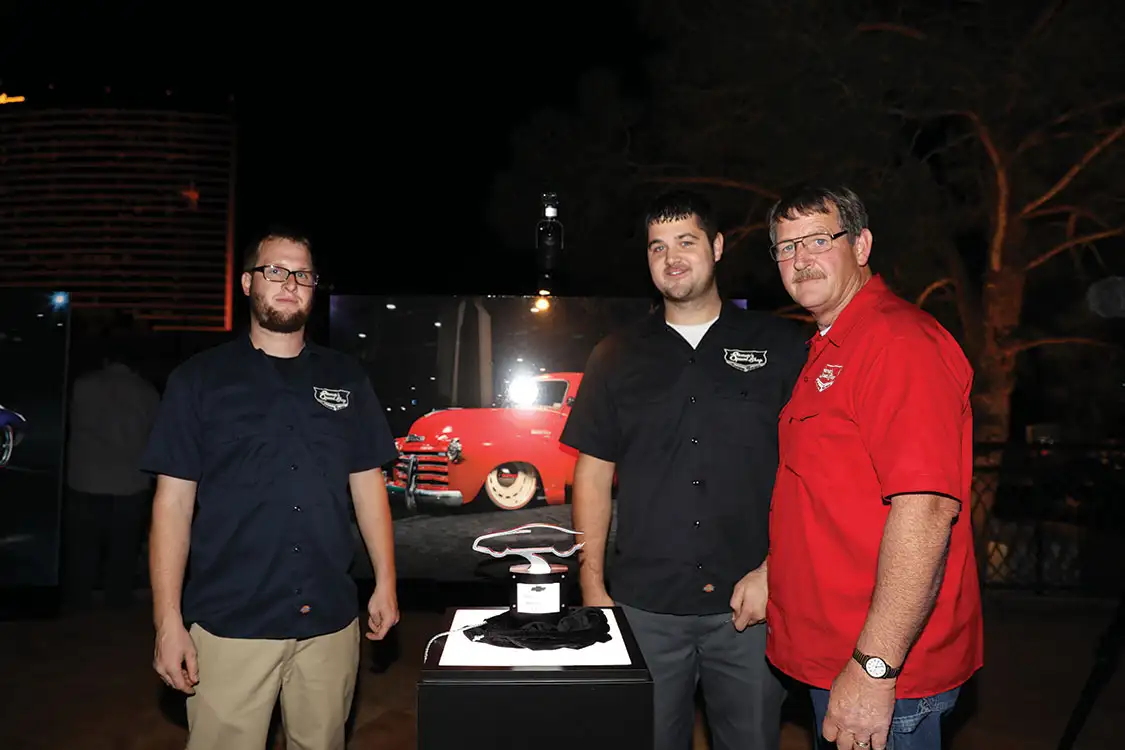 Blaker Stoner stands with his father (right) and Bob Fuller