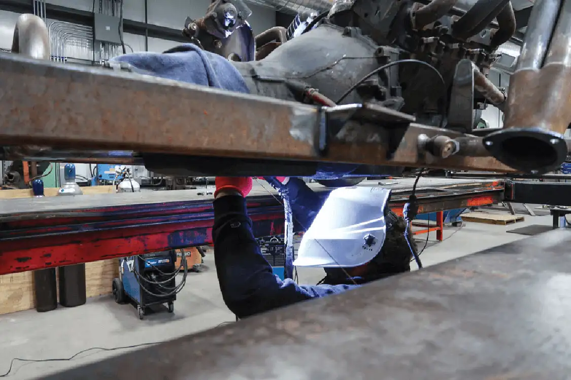 WELDS THE FRAME ON ’29 MODEL A PICKUP