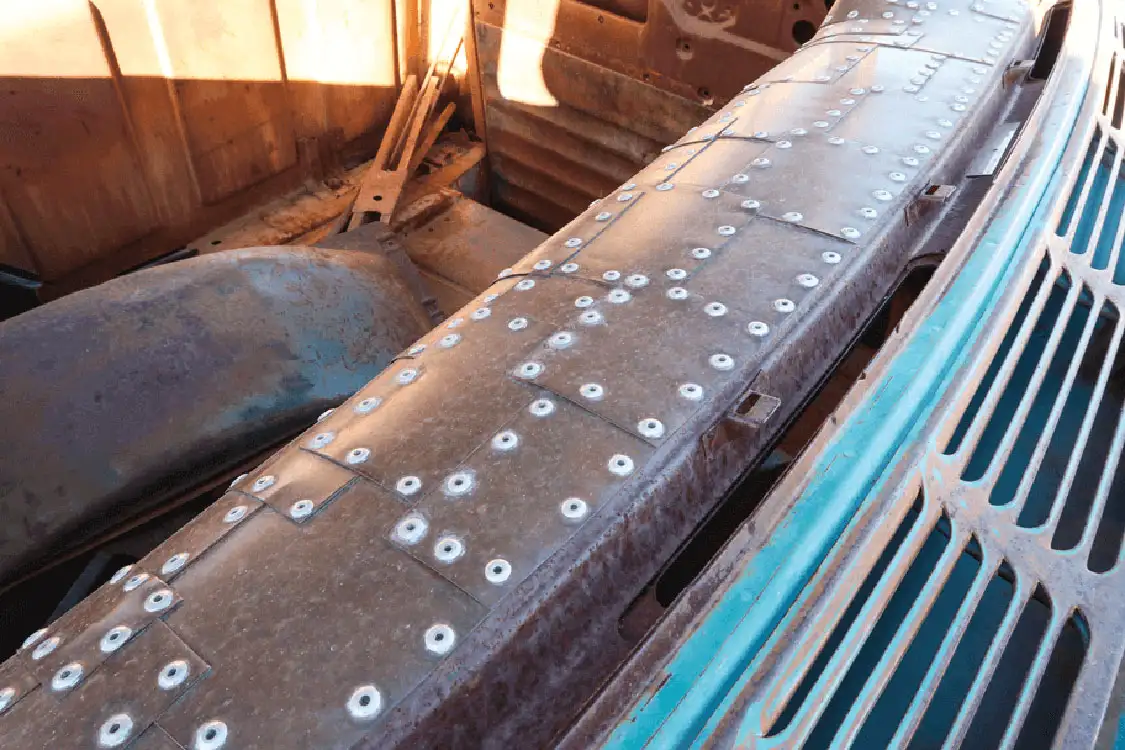 DASHBOARD OF THIS 1955-59 CHEVROLET IS COMPOSED OF SMALL COPPER PIECES